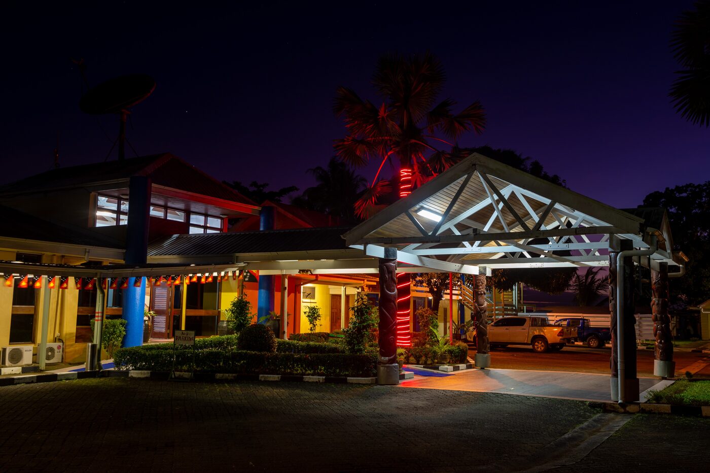 Entrance to Alotau International Hotel at night