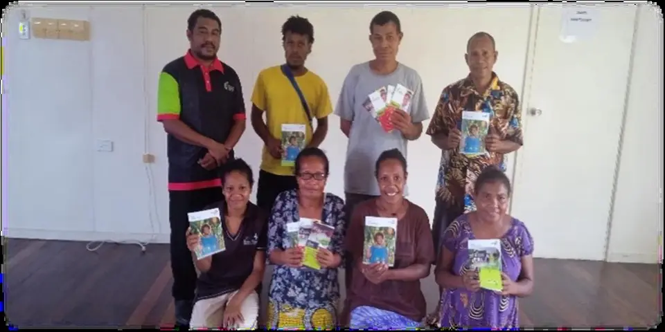 A group pictured in CEFI’s published profile of Lilly Namunu’s financial literacy work.