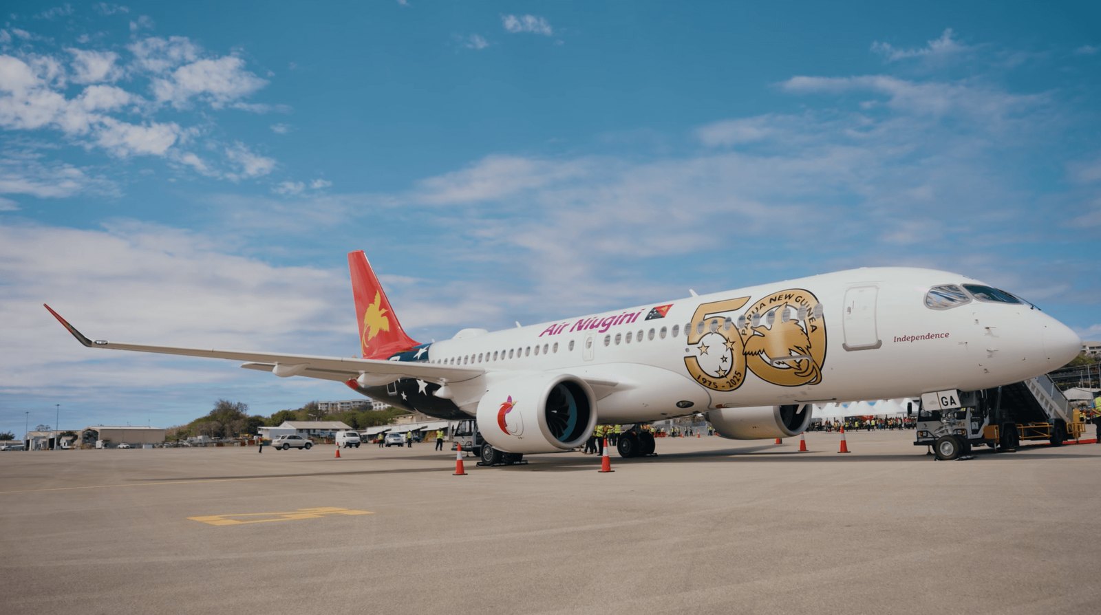 Air Niugini Airbus A220 on the tarmac at Jacksons International Airport, Port Moresby.