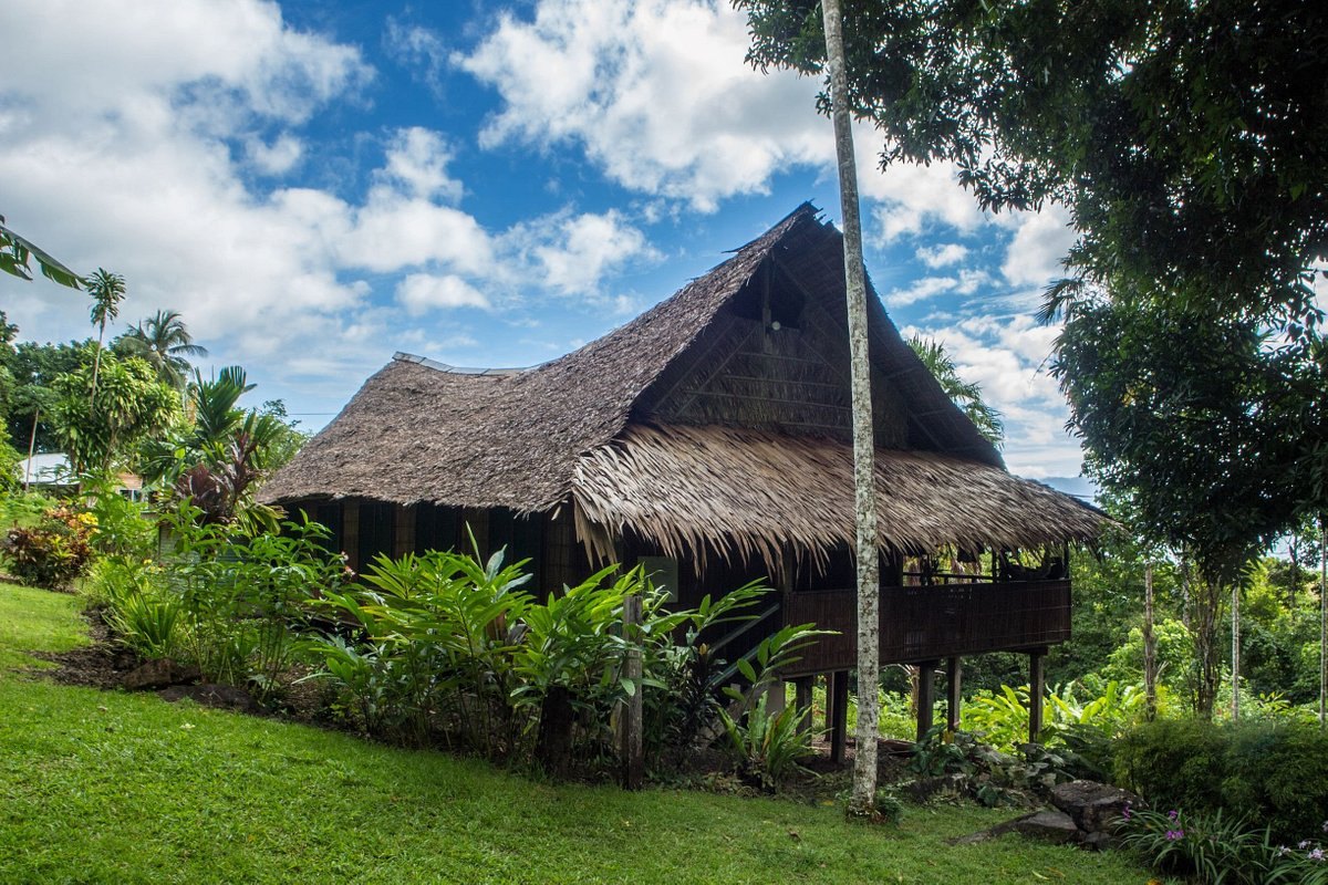 Thatched building featured in PNG Tourism’s Ulumani lodge profile.