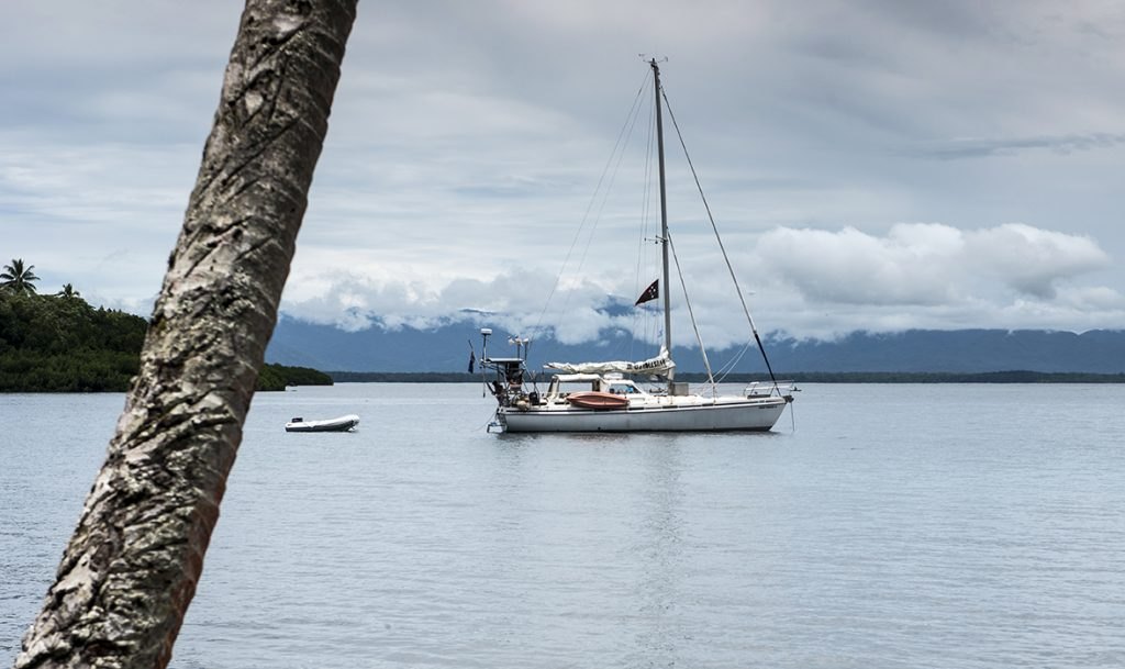 S.V. Westward and crew in Milne Bay, photographed by Robin Jeffries.